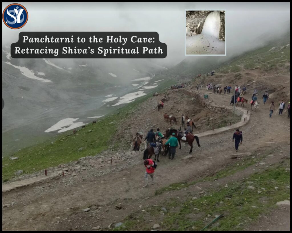 Pilgrims walking through the snow-covered Panchtarni valley toward the Amarnath Holy Cave, with a helicopter flying overhead and the Himalayan peaks in the background, representing the Luxury Amarnath Yatra by Helicopter experience.