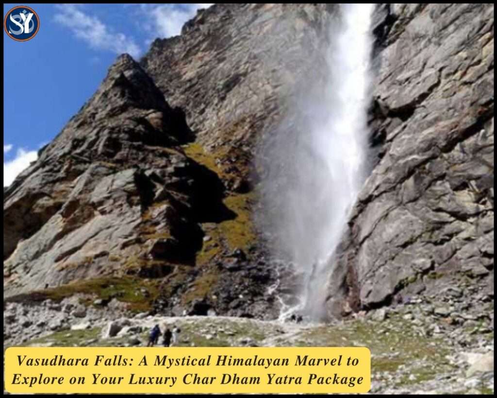 Vasudhara Falls cascading down the Himalayan cliffs near Badrinath, surrounded by lush greenery and mist—an enchanting stop on the Luxury Char Dham Yatra Package.