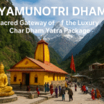 "Yamunotri Dham temple with golden Goddess Yamuna idol, pilgrims in colorful attire, and snow-capped Himalayan peaks – a key site in the Luxury Char Dham Yatra Package."