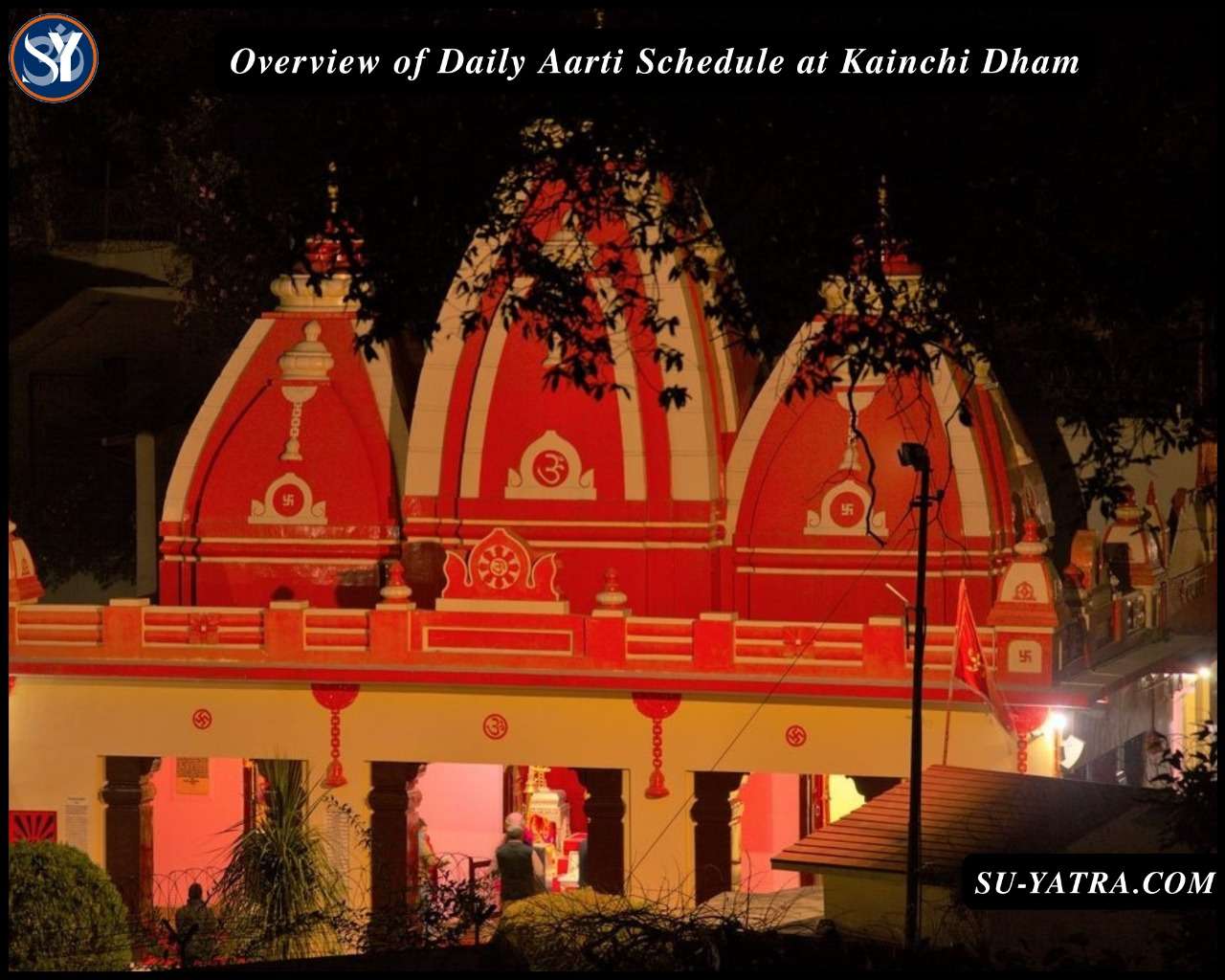 Devotees gathered during the evening Aarti at Kainchi Dham Ashram, with oil lamps glowing and chants filling the air amidst the peaceful Himalayan setting.