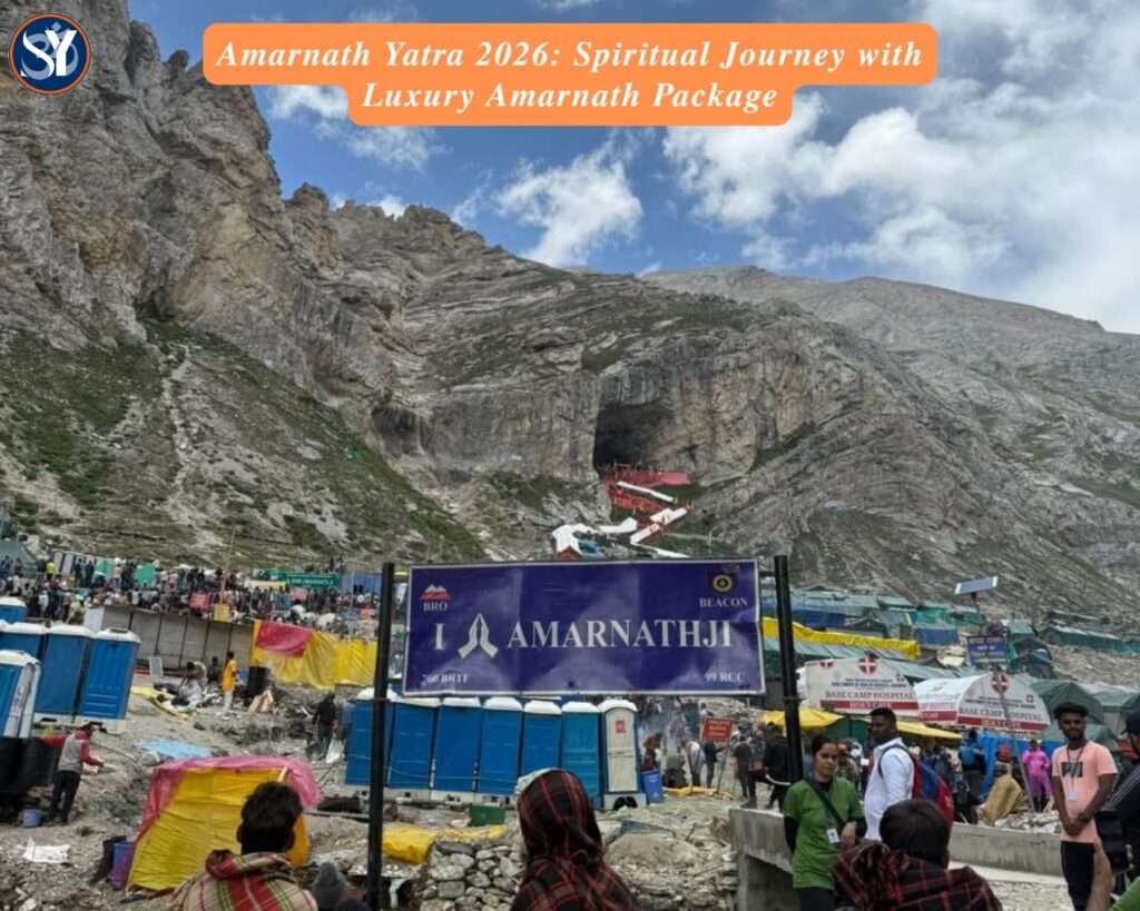 Promotional banner for Amarnath Yatra 2026 featuring the sacred Amarnath Cave with the ice Shivling, set against the Himalayan backdrop, highlighting Luxury Amarnath Package and Amarnath Yatra Package by Helicopter.